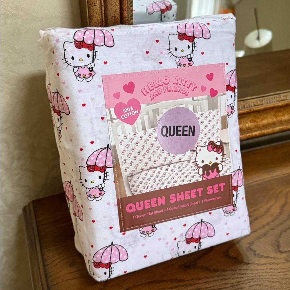 Adorable Hello Kitty Queen Sheet Set - Pink, white, red, black.